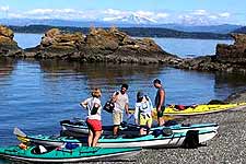 Beaching the kayaks for lunch on the west side of San Juan Island.